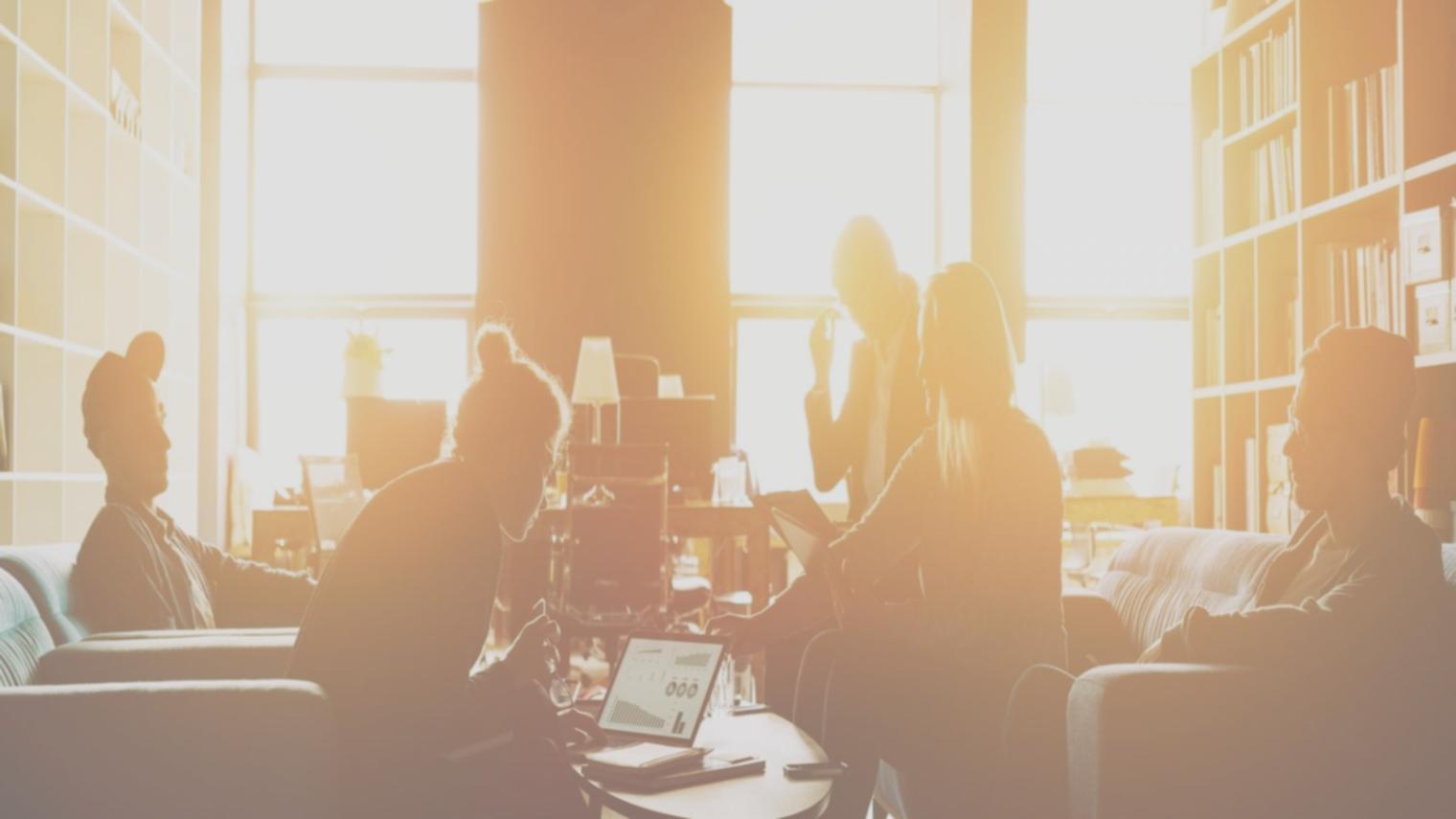 Collaborative research session with investment documents